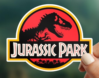 Pegatina impermeable de Parque Jurásico: vinilo de dinosaurio, resistente a arañazos y rayos UV, con el logotipo de Parque Jurásico, T-Rex y nostalgia.