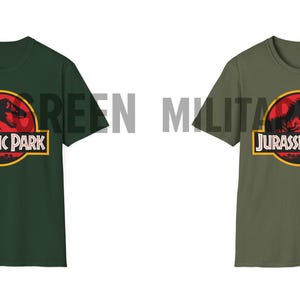 May include: Two short-sleeved t-shirts, one forest green and one military green, each featuring the "Jurassic Park" logo. The logo includes a red circle with a dinosaur silhouette, the words "JURASSIC PARK" in a yellow-bordered rectangle.