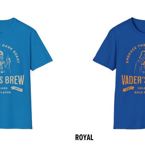 May include: Two blue t-shirts with a graphic of Darth Vader drinking coffee. The text on the shirts reads "Embrace the Dark Roast, Vader's Brew, Est. 1977, Unleash Bold Flavor".