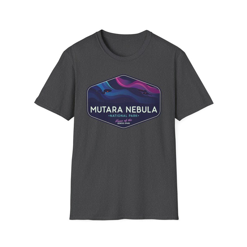 May include: Dark gray t-shirt featuring a graphic of the Mutara Nebula National Park. The design includes a stylized nebula in shades of blue, purple, and pink, with the park's name and location in white text. A short-sleeved, crew neck tee.