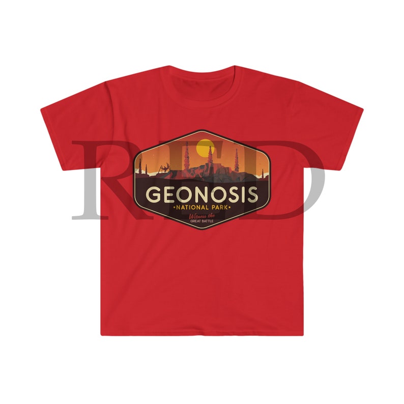 May include: Red t-shirt featuring a vintage-style logo for Geonosis National Park. The logo depicts a sunset over a cityscape with the text "Geonosis National Park" and "Welcome to the Great Battle".