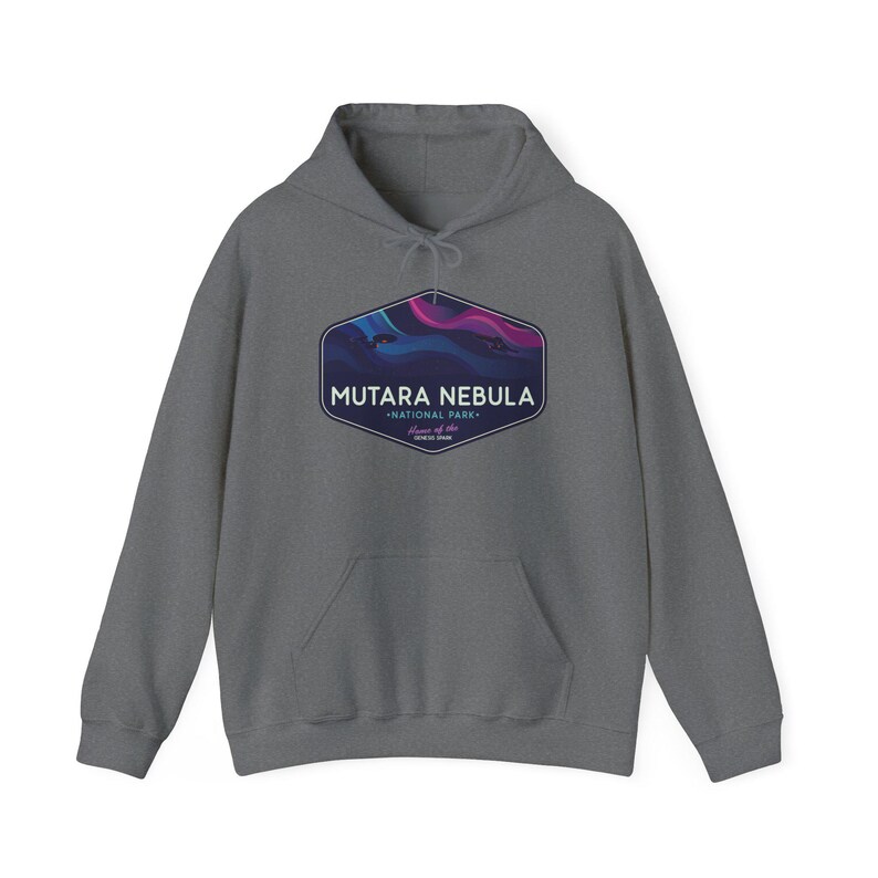 May include: A gray hooded sweatshirt with a front pocket and drawstring. The front features a graphic of the Mutara Nebula National Park with text. The graphic has a blue, purple, and pink color scheme.