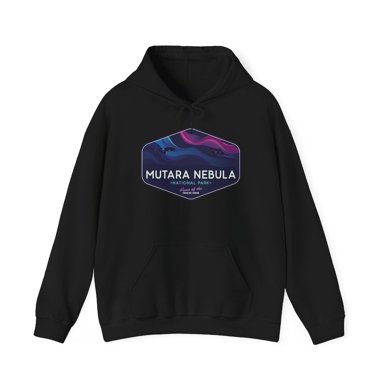 May include: Black hooded sweatshirt with a front pocket and drawstring. The front features a hexagonal design with the text "MUTARA NEBULA NATIONAL PARK" and a colorful nebula graphic in shades of blue, purple, and pink. The phrase "House of the Aurora Borealis" is below.
