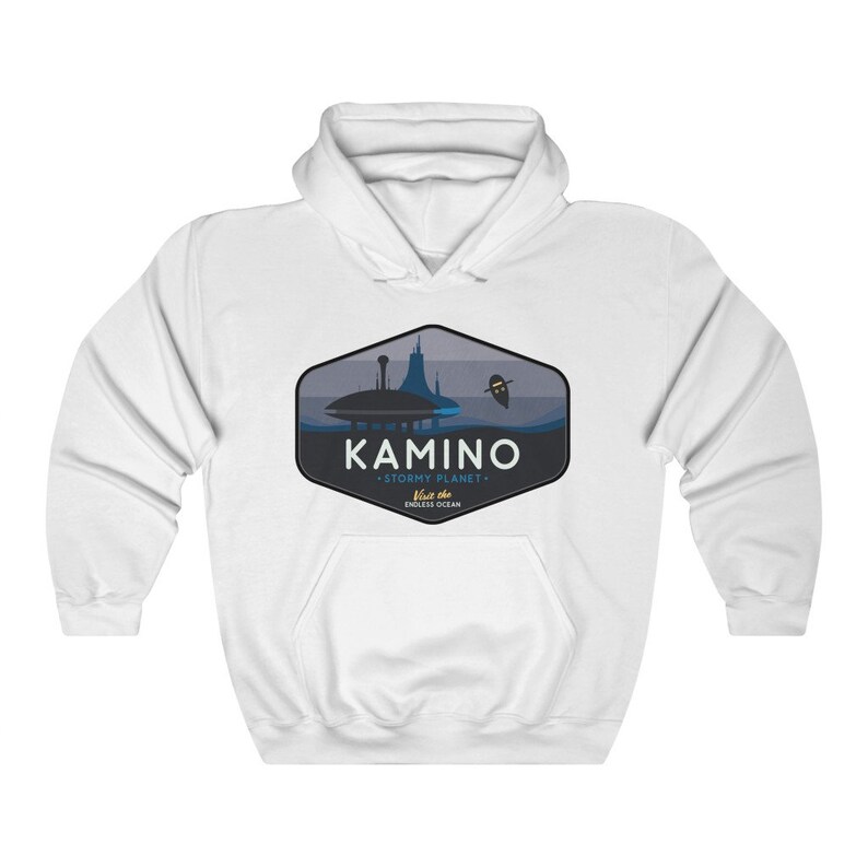 May include: White hooded sweatshirt with a blue and gray graphic of a city on a planet called Kamino. The text on the graphic reads "Kamino - Stormy Planet -  Visit the Endless Ocean".