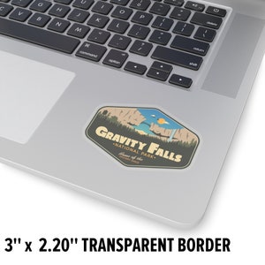 May include: A sticker featuring a retro-style illustration of a mountain range, a lake, and a waterfall. The text reads "Gravity Falls - National Park - Home of the Mystery Shack". The sticker is 3 inches by 2.20 inches and has a transparent border.