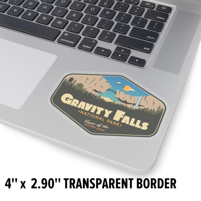 May include: A sticker featuring a retro-style illustration of a mountain range with a waterfall and a UFO. The text reads "Gravity Falls National Park. Home of the Mystery Shack." The sticker is 4 inches by 2.90 inches and has a transparent border.