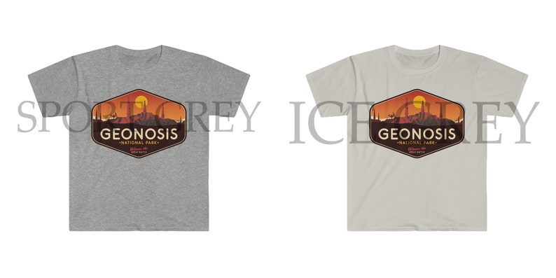 May include: Two t-shirts featuring a graphic design of a sunset over a mountain range with the text "Geonosis National Park" in a hexagon shape. The t-shirts are in grey and white.
