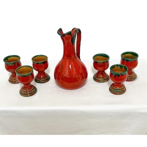 Set per liquori in ceramica smaltata con brocca e sei bicchieri,  vintage anni 70  realizzato artigianalmente West Germany