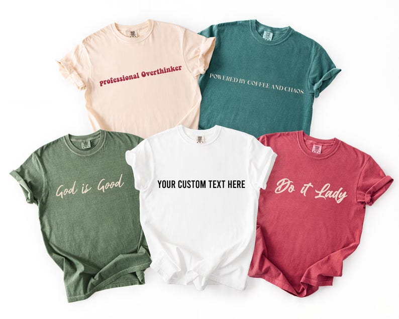 a collection of six t-shirts, each with a unique design and message printed on them.