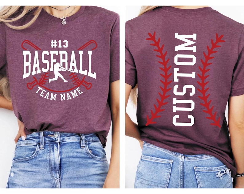 a person wearing a maroon t-shirt with a baseball design and text, as well as a pair of blue jeans.