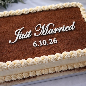 May include: A rustic wooden sign with the text "Welcome to our home" in white lettering. The sign features a distressed finish and a simple, inviting design, perfect for front door decor.