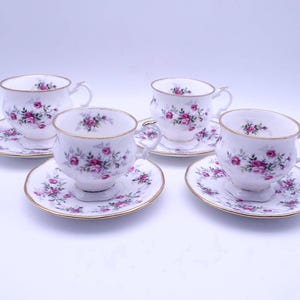 Elizabethan cups and saucers - fine bone china - gold - roses - made in England - set of 4