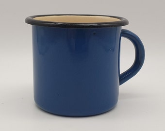 Taza vintage de esmalte azul