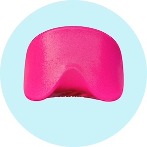 May include: A bright pink contoured pillow designed for neck support. The pillow has a textured surface and a curved shape.