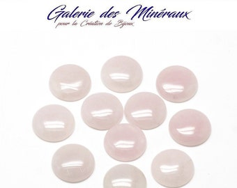 May include: Twelve round, smooth, pale pink cabochons, likely made of rose quartz, for jewelry making.