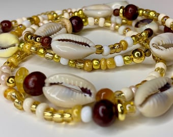 Conta de cintura em concha de cauri