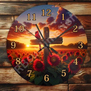 May include: A round clock with a sunset scene and a wooden cross with a cardinal perched on top. The clock face has Roman numerals and a black hand. The background is a field of red sunflowers.