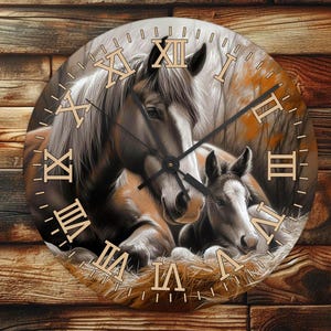 May include: Circular wall clock with a horse and foal illustration. The clock face has Roman numerals and black hands. The background has a wooden texture. The clock is a decorative item.