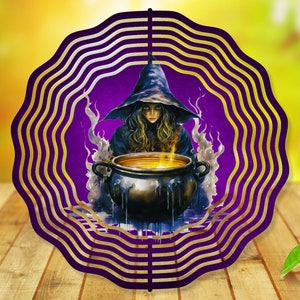 May include: A purple and gold metal wind spinner with a witch stirring a cauldron of bubbling liquid. The witch is wearing a black pointed hat and a blue robe.