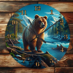 May include: Round wall clock featuring a brown bear standing near a river in a forest scene. The clock face has black hands and gold numerals. The background shows a blue sky, mountains, and trees. The clock is mounted on a wooden wall.