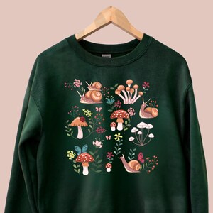Snail Sweatshirt | Whimsical Snail with Mushrooms Sweater | Cottage Core Sweater | Fairycore | Goblincore Crewneck |Snail Gift | Forestcore