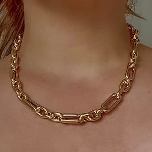 Collana con catena a maglie in oro 14 carati / Catena a maglie in oro / Collana con graffetta / Collana con catena a graffetta / Girocollo con catena a maglie / Catena a graffetta fantasia
