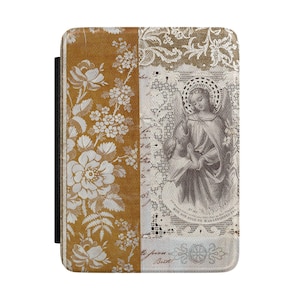 May include: A rectangular e-reader case featuring a split design. The left side displays a mustard yellow background with a white floral pattern. The right side shows a cream-colored lace texture with a central illustration of an angel and child.