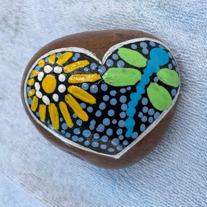 Dragonfly and flower painted rock for garden