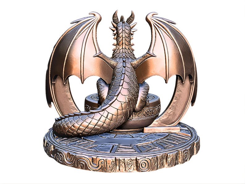 May include: Bronze-colored dragon statue with outstretched wings, perched on a decorative base. The dragon has detailed scales, horns, and a long tail. The base features intricate carvings and a circular design, creating a fantasy-themed sculpture.