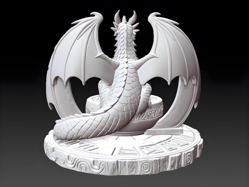 May include: A white dragon sculpture with large, detailed wings and a long tail. The dragon is seated on a round base with engraved patterns. The sculpture has a detailed, textured surface and is set against a dark background.