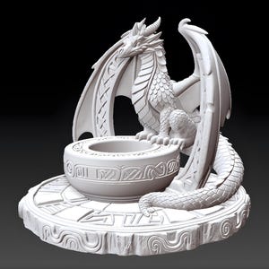 May include: A white dragon sculpture with detailed scales, horns, and wings. The dragon sits atop a round, engraved platform with a central bowl. The sculpture is a fantasy-themed decorative item.