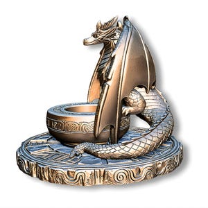 May include: Bronze dragon sculpture with intricate details. The dragon has outstretched wings and is coiled around a bowl-shaped structure. The base is circular with ornate patterns. A decorative piece.
