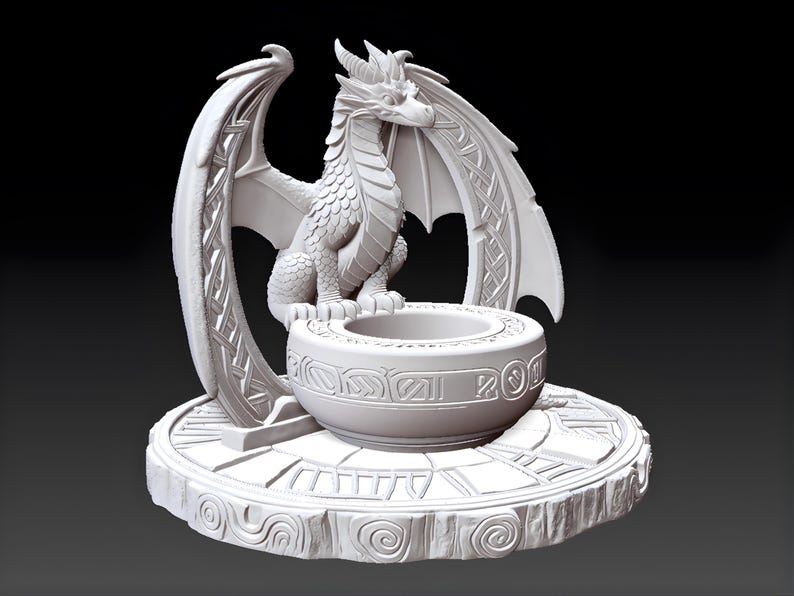 May include: A white dragon sculpture with intricate details. The dragon sits atop a round base with a bowl in front. The wings are spread, and the sculpture has a fantasy theme.