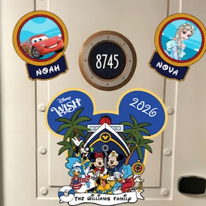 a door decorated with Disney-themed stickers and a large sticker with a cartoon character.