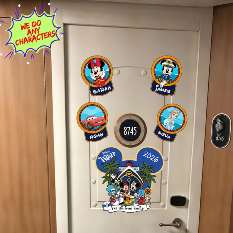 a door decorated with Disney-themed stickers and a large sticker with a cartoon character.