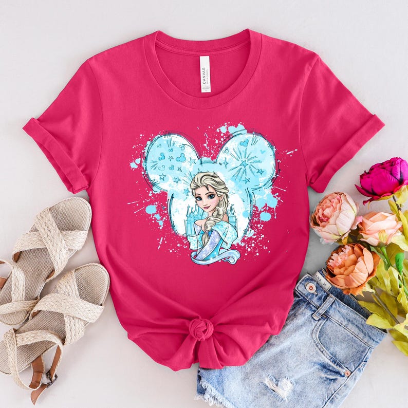 a pink shirt with a picture of a frozen princess on it