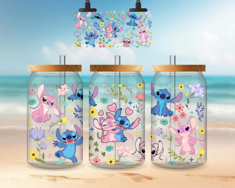 three glass jars with colorful and whimsical designs, including cartoon characters and floral patterns.