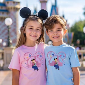 two young girls standing next to each other in front of a castle