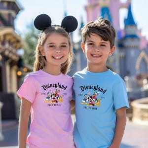 a couple of kids standing next to each other