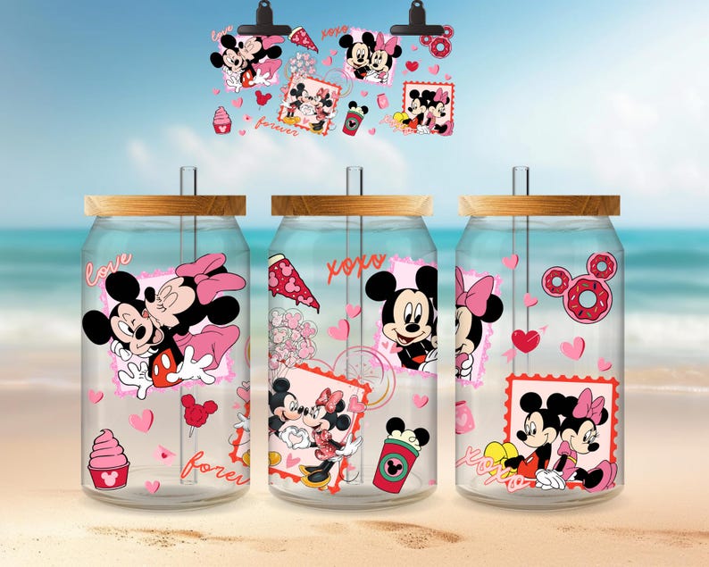 May include: Three clear glass can-shaped tumblers with wooden lids and straws, decorated with Mickey and Minnie Mouse graphics. The designs include pink hearts, ice cream, and the words "love" and "forever". A matching clip holds additional graphics.