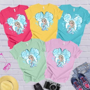 four t - shirts with a picture of a fairy on them