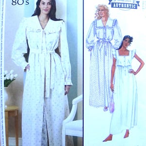 May include: McCall's vintage 80's sewing pattern featuring a Laura Ashley design. The pattern includes options for a long dress and robe with a floral print. The image shows a woman wearing the robe. The pattern is authentic.