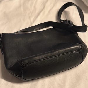 Coach Y2K Black leather. Fabric gold beige coach logo interior Measures approx 7.5