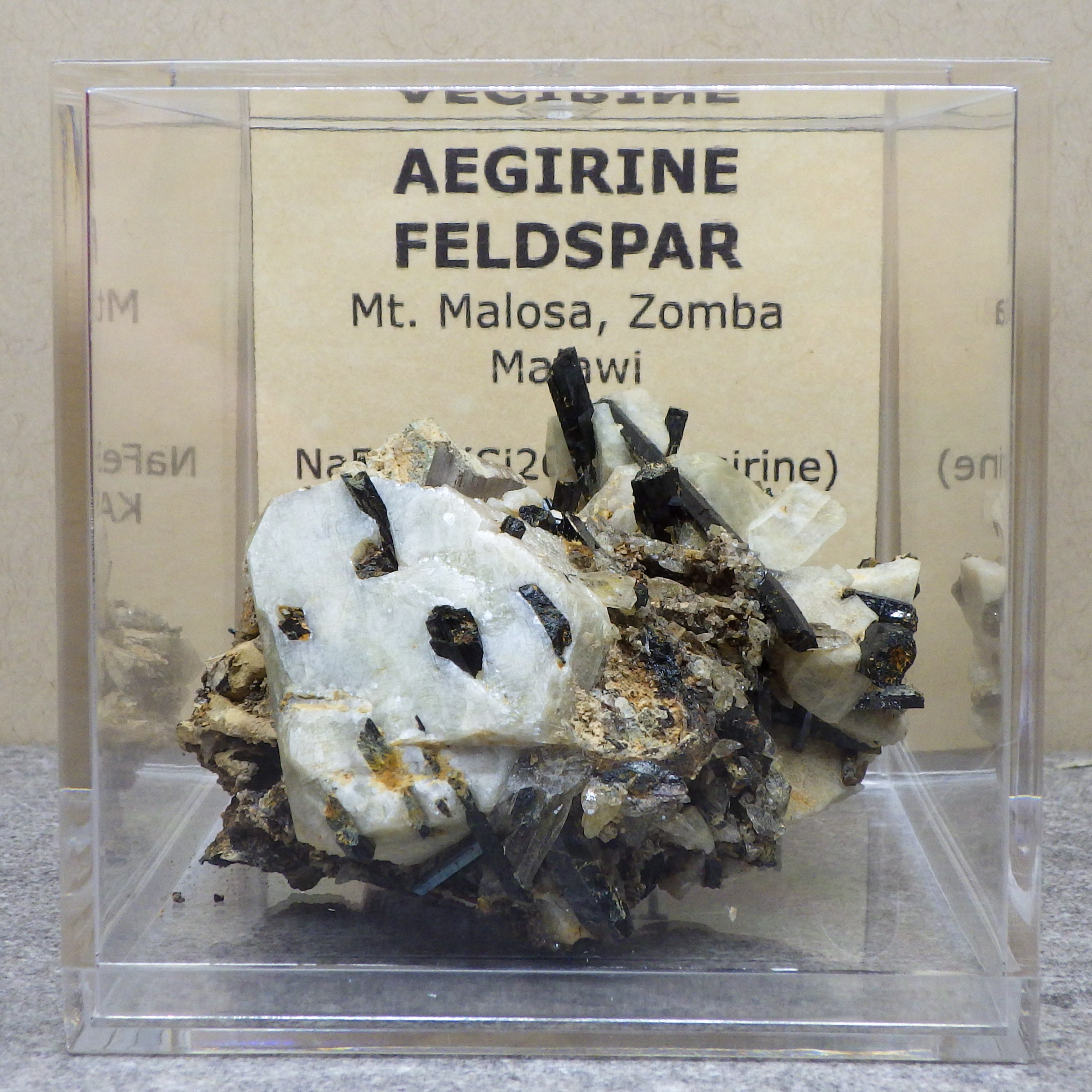 Great Aegirine Specimen With Microcline Feldspar Multiple Aegirine embedded within the Feldspar with 2.4in x 2.4in. Display Box and ID card