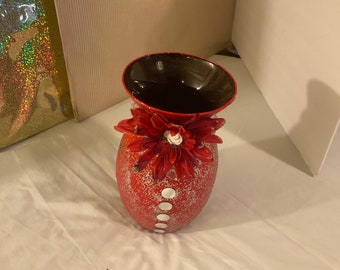 A 11”H x 8”W x 10”D  Handmade Red and Silver Decorative  Flower Glass Vase designed with a flower and gemstones.