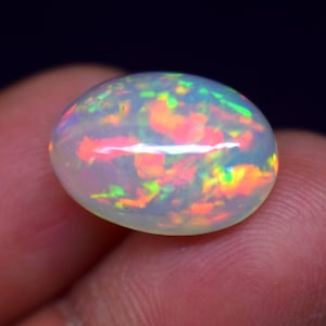 AAA++ Top Quality Natural Ethiopian Opal Cabochon Multi Fire Opal Gemstone Fire Opal Cabochon Oval Shape For Making Jewelry .