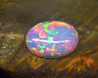 Natuurlijke Ethiopische witte opaal cabochon roze vuur: sieraden maken van AAA-kwaliteit