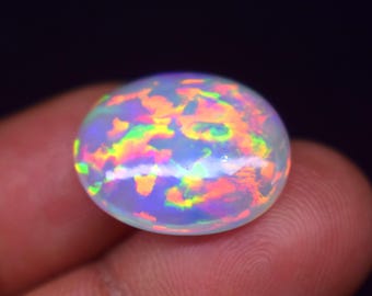 Äthiopischer Opal Cabochon: Auffälliger Welo-Opal zur Schmuckherstellung (18.8X15,7X6,4 MM, 9.05 Ct