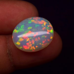 AAA++ Top Quality Natural Ethiopian Opal Cabochon Doted Fire Opal Gemstone Fire Opal Cabochon Oval Shape For Making Jewelry .