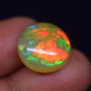 Ethiopian Welo Opal Cabochon: Round Rainbow Gemstone (15.6X7X MM, 8.01 Ct